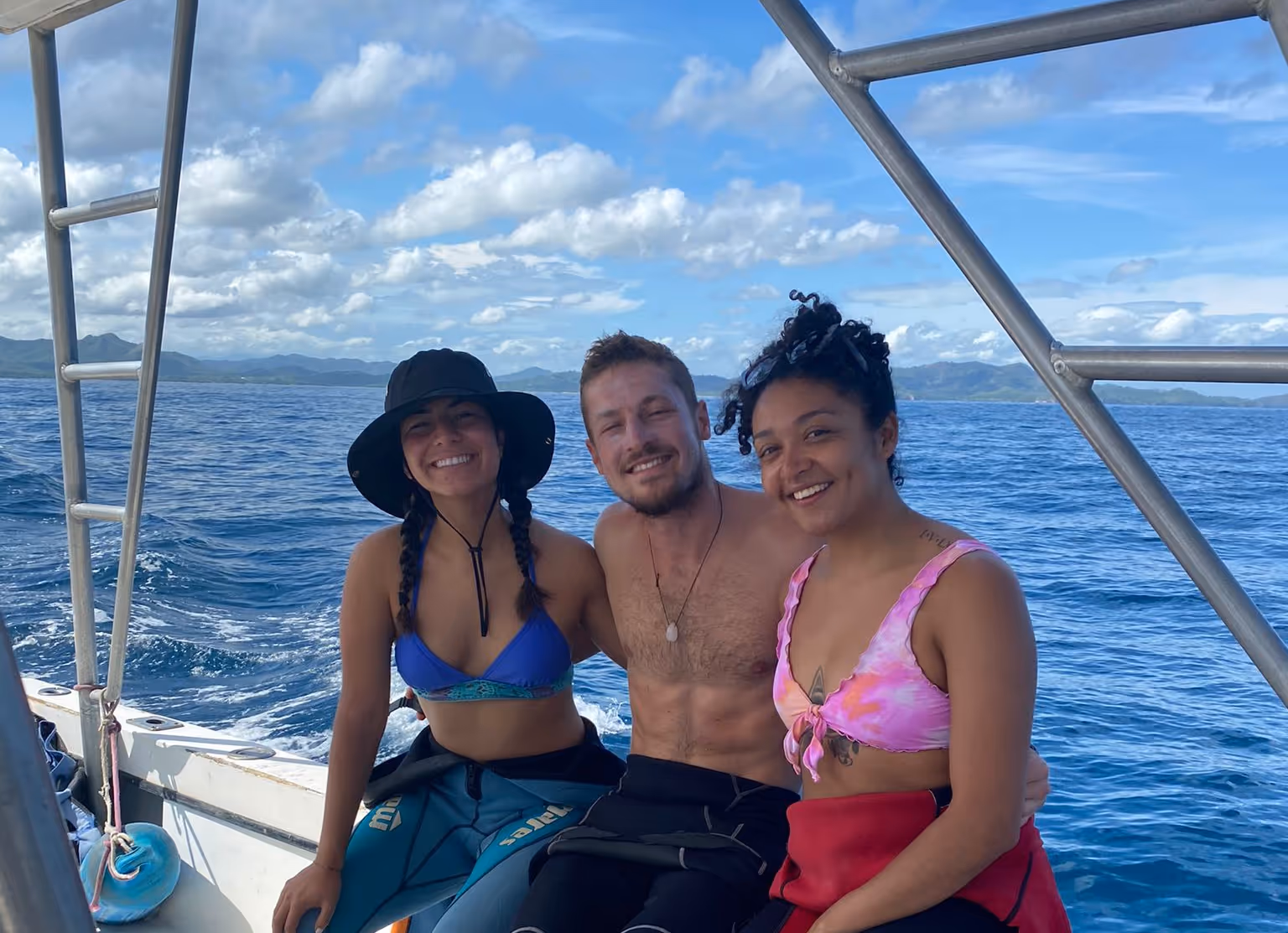 Spotted eagle ray cruising through clear tropical waters Spotted eagle ray cruising through clear tropical waters